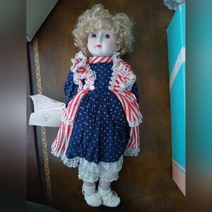 Porcelain Doll with Blue Dress and Blonde Hair